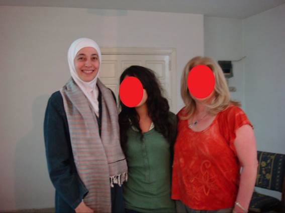 A group of women posing for a photo

Description automatically generated